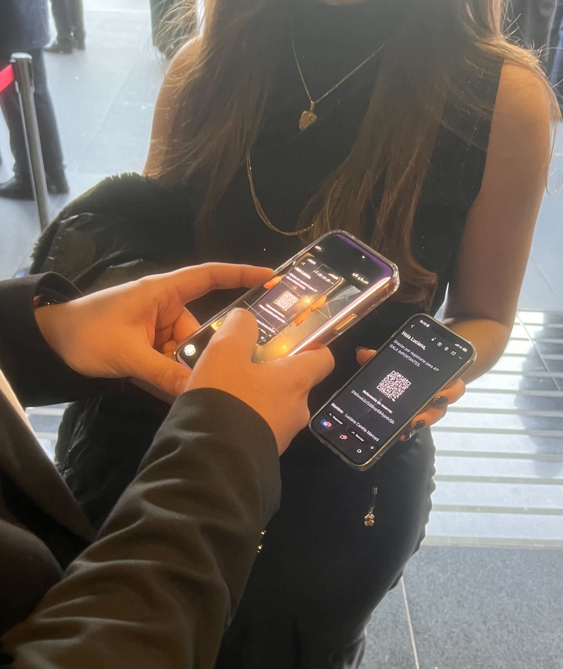Attendees checking in with QR codes on their phones